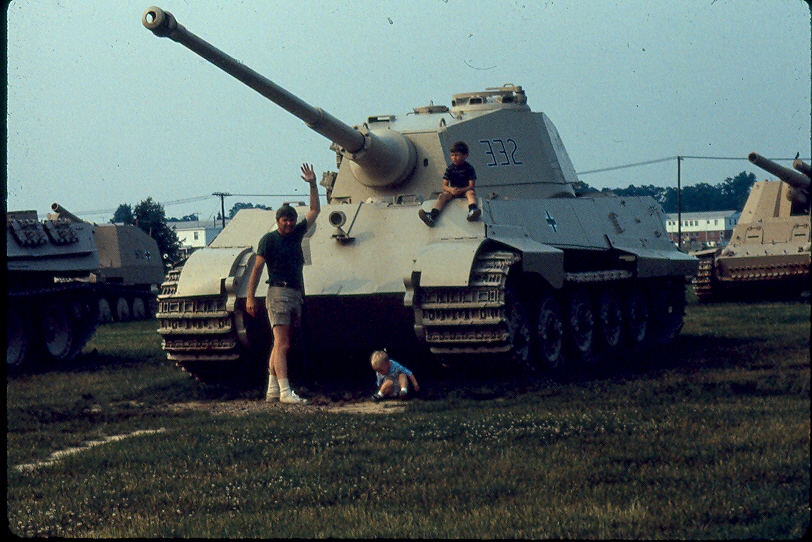 Devin Edwards with historic armored vehicles at the U.S. Army Ordnance Museum at Aberdeen Proving Ground, Maryland